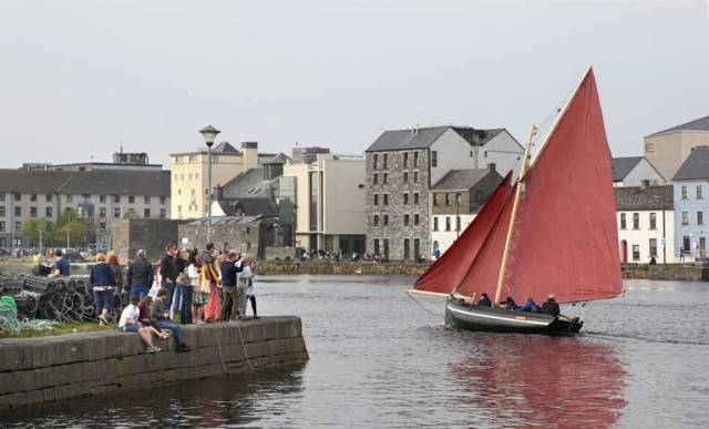 The restored 137 year-old Gleoiteog, the Lovely Anne, sails to Claddagh Quay during it's re-launch in Galway city. The boat, built in 1882, was restored as part of a community training project between Bádóirí an Cladaig and Galway Hooker 2020.