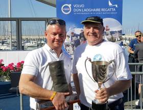 Dave Gorman (left) and Chris Doorly with the Boat of the Week &#039;Dubarry Boot&#039; Trophy and Flying Fifteen Cup