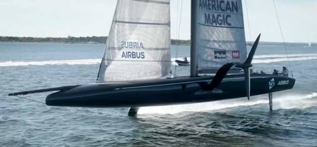 The first of American Magic's two AC75's is officially named DEFIANT in front of friends and family during a ceremony at the team's base of operation in Portsmouth, Rhode Island.